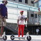Robert E. Cornegy, Jr., city councilman of District 36, on a Bird scooter (left) in NYC. Photos: Justin Westbrook (Jalopnik)